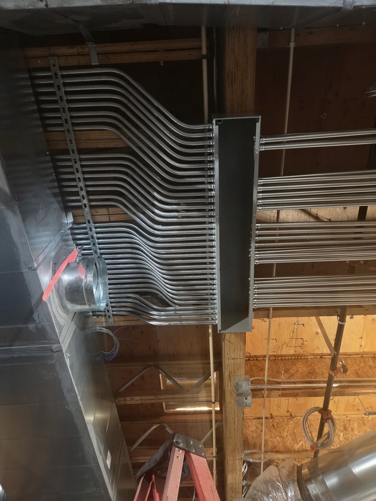EMT conduit rack bent and landed in a trough
